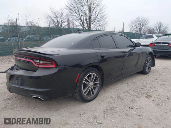 2019 Dodge Charger SXT with VIN 2C3CDXJG7KH757728, listed as a IAAI auction lot 41797017 with 68,063 mi miles and . Bid and sale history available at DreamBid. Image 4.