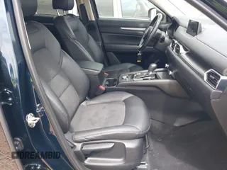 2020 Mazda CX-5 Touring with VIN JM3KFBCM9L0741535, listed as a IAAI auction lot 42101763 with 54,004 mi miles and . Bid and sale history available at DreamBid. Image 5.