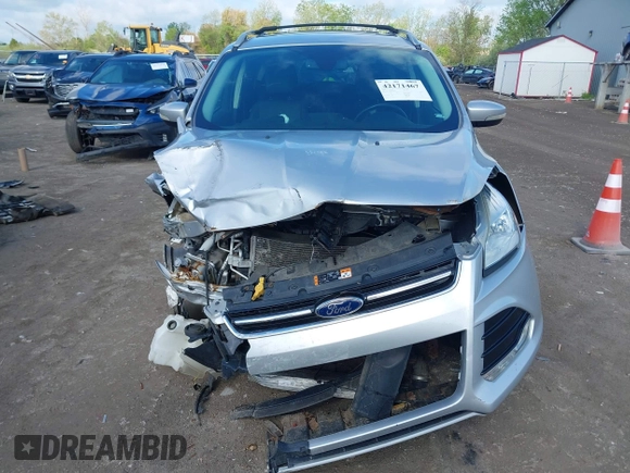 2015 Ford Escape Titanium z VIN 1FMCU9J99FUC75852, wystawiony jako IAAI lot #42171467 z przebiegiem 113 322 mil mil oraz . Historia ofert i sprzedaży dostępna na DreamBid. Obrazek 12.