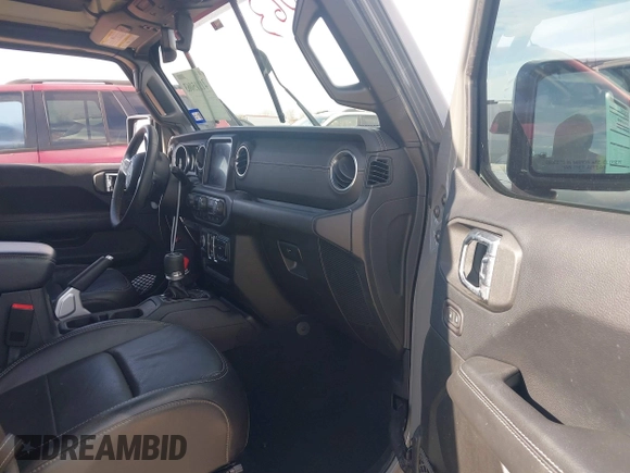 2018 Jeep Wrangler Unlimited Sahara z VIN 1C4HJXEN9JW215890, wystawiony jako IAAI lot #41215063 z przebiegiem 39 567 mil mil oraz . Historia ofert i sprzedaży dostępna na DreamBid. Obrazek 5.
