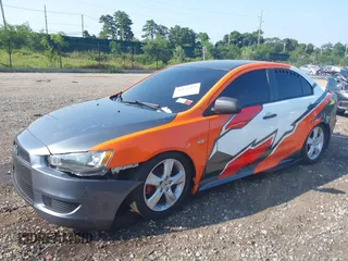2014 Mitsubishi Lancer GT with VIN JA32U8FW6EU015415, listed as a IAAI auction lot 40171318 with 40,000 mi miles. Bid and sale history available at carsss.com. Image 2.