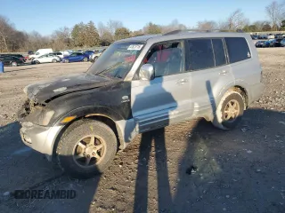 2001 Mitsubishi Montero Limited z VIN JA4MW51R81J030640, wystawiony jako Copart lot #47873715 z przebiegiem Nie podano mil oraz Szkody całkowita. Historia ofert i sprzedaży dostępna na DreamBid. Obrazek 1.
