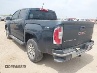 2019 GMC Canyon 4WD SLE z VIN 1GTG6CENXK1261278, wystawiony jako IAAI lot #42064295 z przebiegiem 51 786 mil mil oraz . Historia ofert i sprzedaży dostępna na DreamBid. Obrazek 3.