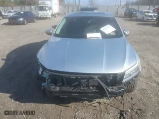 2016 Volkswagen Passat 1.8T SEL with VIN 1VWCT7A35GC011006, listed as a IAAI auction lot 41039744 with 123,422 mi miles. Bid and sale history available at carsss.com. Image 12.