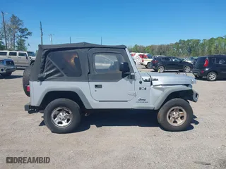 2006 Jeep Wrangler X with VIN 1J4FA39S86P743660, listed as a IAAI auction lot 41890339 with 198,099 mi miles. Bid and sale history available at carsss.com. Image 13.