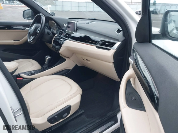 2018 BMW X1 sDrive28i with VIN WBXHU7C32J5H44246, listed as a IAAI auction lot 41477050 with 69,858 mi miles. Bid and sale history available at carsss.com. Image 5.