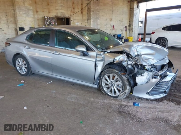 2023 Toyota Camry LE z VIN 4T1C11AK5PU127664, wystawiony jako IAAI lot #41653925 z przebiegiem 24 378 mil mil oraz . Historia ofert i sprzedaży dostępna na DreamBid. Obrazek 1.