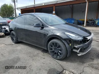 2022 Tesla Model Y Long Range z VIN 7SAYGDEE7NA014402, wystawiony jako Copart lot #56325005 z przebiegiem 41 171 mil mil oraz Szkody całkowita. Historia ofert i sprzedaży dostępna na DreamBid. Obrazek 4.
