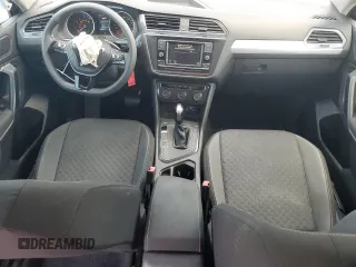 2021 Volkswagen Tiguan S with VIN 3VV1B7AX9MM023655, listed as a Copart auction lot 64159445 with 55,795 mi miles and Salvage title. Bid and sale history available at DreamBid. Image 8.