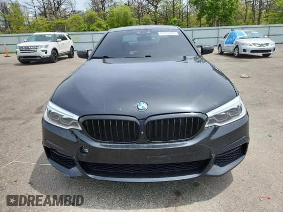 2019 BMW 5 Series 540i xDrive with VIN WBAJE7C53KWD55234, listed as a Copart auction lot 57797475 with 81,844 mi miles and Salvage title. Bid and sale history available at DreamBid. Image 5.
