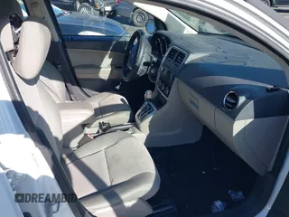 2011 Dodge Caliber Mainstreet with VIN 1B3CB3HA0BD113353, listed as a IAAI auction lot 41727663 with 116,633 mi miles and . Bid and sale history available at DreamBid. Image 5.