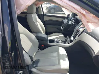 2014 Cadillac SRX Luxury Collection z VIN 3GYFNEE32ES659705, wystawiony jako IAAI lot #42148269 z przebiegiem 140 560 mil mil oraz . Historia ofert i sprzedaży dostępna na DreamBid. Obrazek 5.