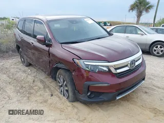 2021 Honda Pilot EX z VIN 5FNYF5H36MB027658, wystawiony jako IAAI lot #41878891 z przebiegiem 62 454 mil mil oraz . Historia ofert i sprzedaży dostępna na DreamBid. Obrazek 1.