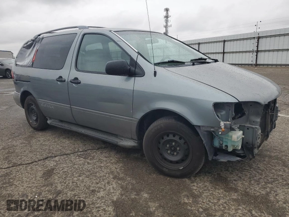 2000 Toyota Sienna LE with VIN 4T3ZF13C2YU217185, listed as a Copart auction lot 82407944 with 244,381 mi miles and Salvage Title. Bid and sale history available at DreamBid. Image 4.