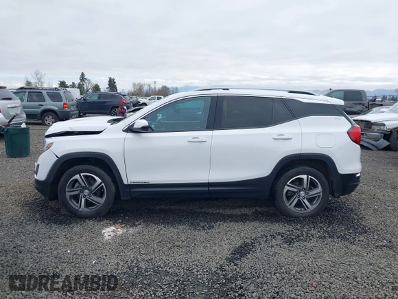 2020 GMC Terrain SLT z VIN 3GKALVEVXLL143417, wystawiony jako IAAI lot #41714662 z przebiegiem 97 634 mil mil oraz . Historia ofert i sprzedaży dostępna na DreamBid. Obrazek 14.