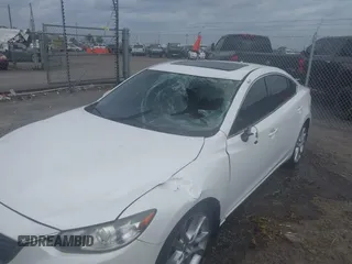 2016 Mazda 6 i Touring with VIN JM1GJ1V56G1448334, listed as a IAAI auction lot 42075222 with 52,883 mi miles. Bid and sale history available at carsss.com. Image 6.