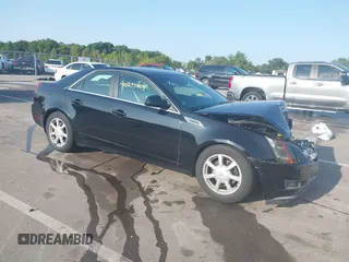2008 Cadillac CTS AWD z VIN 1G6DH577380194435, wystawiony jako IAAI lot #40255409 z przebiegiem 157 226 mil mil oraz . Historia ofert i sprzedaży dostępna na DreamBid. Obrazek 1.