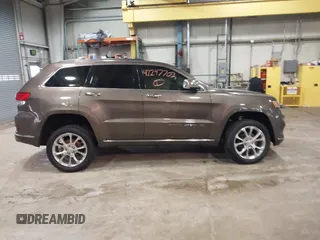 2020 Jeep Grand Cherokee Summit with VIN 1C4RJFJG1LC170714, listed as a IAAI auction lot 42247702 with 78,614 mi miles and . Bid and sale history available at DreamBid. Image 14.