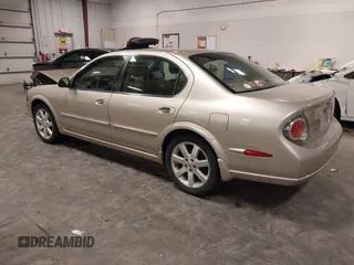 2002 Nissan Maxima GLE z VIN JN1DA31AX2T305310, wystawiony jako IAAI lot #42302521 z przebiegiem 68 920 mil mil oraz . Historia ofert i sprzedaży dostępna na DreamBid. Obrazek 3.