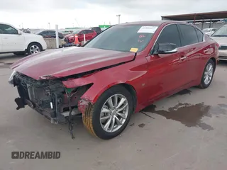 2014 Infiniti Q50 Premium z VIN JN1BV7AP8EM673359, wystawiony jako IAAI lot #42300427 z przebiegiem 118 779 mil mil oraz . Historia ofert i sprzedaży dostępna na DreamBid. Obrazek 19.