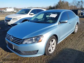 2013 Volkswagen Passat SE with VIN 1VWBP7A38DC095902, listed as a IAAI auction lot 41324349 with 170,771 mi miles. Bid and sale history available at carsss.com. Image 2.