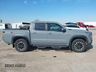 2022 Nissan Frontier SV with VIN 1N6ED1EJ0NN654747, listed as a IAAI auction lot 41271819 with 51,021 mi miles and . Bid and sale history available at DreamBid. Image 14.