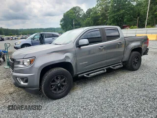 2019 Chevrolet Colorado 4WD Z71 with VIN 1GCGTDEN3K1190259, listed as a Copart auction lot 58973735 with 133,555 mi miles and Salvage title. Bid and sale history available at DreamBid. Image 1.
