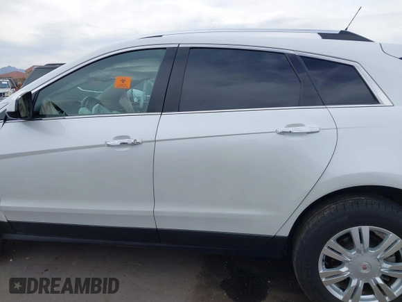 2012 Cadillac SRX Luxury Collection with VIN 3GYFNAE34CS606963, listed as a IAAI auction lot 41815097 with Not Provided miles and . Bid and sale history available at carsss.com. Image 14.