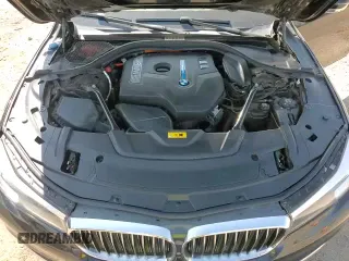 2017 BMW 7 Series 740e xDrive with VIN WBA7J2C31HG497945, listed as a Copart auction lot 80494365 with 54,846 mi miles and Salvage title. Bid and sale history available at DreamBid. Image 14.