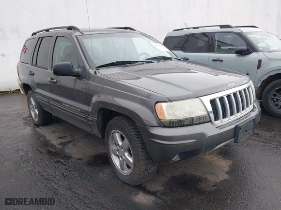2004 Jeep Grand Cherokee Limited with VIN 1J4GW58N34C399673, listed as a IAAI auction lot 41976505 with 194,005 mi miles. Bid and sale history available at carsss.com. Image 1.