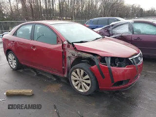 2011 Kia Forte SX with VIN KNAFW4A36B5387987, listed as a IAAI auction lot 41421863 with 157,305 mi miles. Bid and sale history available at carsss.com. Image 1.