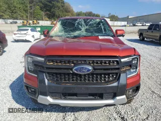 2024 Ford Ranger LARIAT with VIN 1FTER4KH8RLE11891, listed as a Copart auction lot 77827834 with 12,423 mi miles and Salvage Title. Bid and sale history available at carsss.com. Image 5.