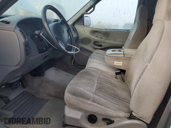 1997 Ford F-150 с VIN 1FTDX1728VNC50512, выставлен на аукционе Copart как лот 86523634 с пробегом 186 533 миль миль и Списание • Salvage title. История ставок и продаж доступна на DreamBid. Изображение 7.