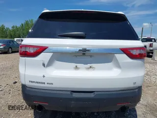 2020 Chevrolet Traverse LT Cloth with VIN 1GNEVGKWXLJ189084, listed as a IAAI auction lot 42763866 with 72,713 mi miles and . Bid and sale history available at DreamBid. Image 16.