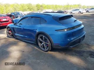 2023 Porsche Taycan 4S z VIN WP0BB2Y19PSA65443, wystawiony jako IAAI lot #42105240 z przebiegiem 265 mil mil oraz . Historia ofert i sprzedaży dostępna na DreamBid. Obrazek 3.