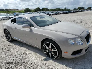 2014 Bentley Continental GT with VIN SCBFT7ZA7EC094358, listed as a Copart auction lot 42711585 with 19,779 mi miles and Salvage Title. Bid and sale history available at DreamBid. Image 4.
