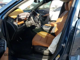 2024 Cadillac XT4 FWD Sport with VIN 1GYFZER40RF249101, listed as a Copart auction lot 76312304 with 1,969 mi miles and Salvage title. Bid and sale history available at DreamBid. Image 7.