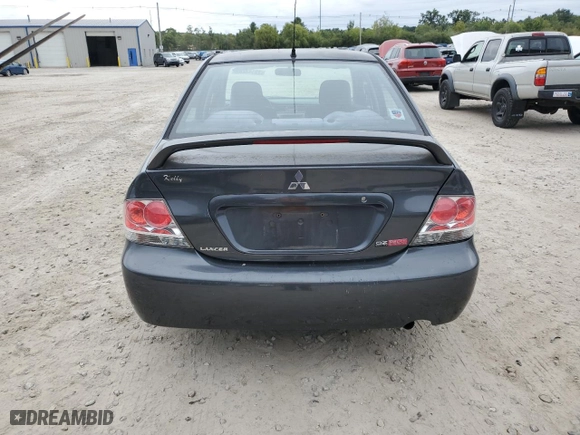 2004 Mitsubishi Lancer OZ-Rally with VIN JA3AJ86E04U029594, listed as a Copart auction lot 73143284 with 71,623 mi miles and Clean Title. Bid and sale history available at carsss.com. Image 6.