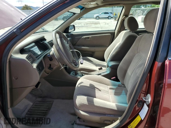 2001 Toyota Camry LE z VIN 4T1BF28K51U124747, wystawiony jako Copart lot #57482825 z przebiegiem 108 262 mil mil oraz Szkoda całkowita • Salvage title. Historia ofert i sprzedaży dostępna na DreamBid. Obrazek 7.
