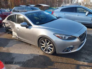2014 Mazda 3 S Grand Touring with VIN JM1BM1W38E1184450, listed as a IAAI auction lot 40954511 with 157,036 mi miles and . Bid and sale history available at DreamBid. Image 1.