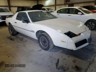 1984 Pontiac Firebird z VIN 1G2AS87H8EL260830, wystawiony jako Copart lot #84198714 z przebiegiem 95 966 mil mil oraz Szkoda całkowita • Salvage title. Historia ofert i sprzedaży dostępna na DreamBid. Obrazek 4.
