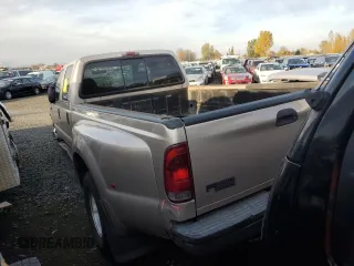 1999 Ford F-350 XL with VIN 1FTWW32F4XED06675, listed as a Copart auction lot 78982514 with 329,060 mi miles and Salvage title. Bid and sale history available at DreamBid. Image 2.