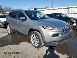 2015 Jeep Cherokee Limited with VIN 1C4PJMDS6FW718382, listed as a Copart auction lot 49946065 with 144,614 mi miles and Salvage Title. Bid and sale history available at DreamBid. Image 4.