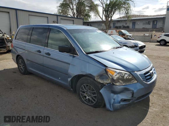 2010 Honda Odyssey LX with VIN 5FNRL3H23AB054658, listed as a Copart auction lot 62322195 with 160,550 mi miles and Salvage title. Bid and sale history available at DreamBid. Image 4.