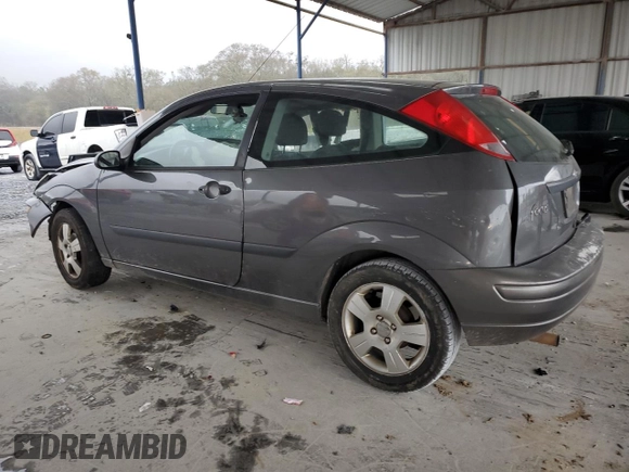 2003 Ford Focus ZX3 with VIN 3FAFP31Z73R178518, listed as a Copart auction lot 50200105 with 317,147 mi miles and Salvage title. Bid and sale history available at DreamBid. Image 2.