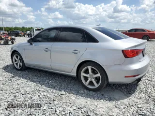 2016 Audi A3 1.8T Premium with VIN WAUA7GFF7G1052909, listed as a Copart auction lot 51735025 with 100,737 mi miles and Salvage Title. Bid and sale history available at carsss.com. Image 2.