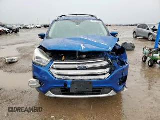 2018 Ford Escape Titanium with VIN 1FMCU9J98JUB31234, listed as a Copart auction lot 58817705 with 140,183 mi miles and Salvage title. Bid and sale history available at DreamBid. Image 5.