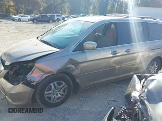 2007 Honda Odyssey EX with VIN 5FNRL38437B074662, listed as a IAAI auction lot 40716076 with 228,344 mi miles. Bid and sale history available at carsss.com. Image 2.