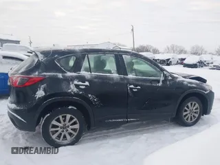 2016 Mazda CX-5 Sport z VIN JM3KE4BY0G0919017, wystawiony jako IAAI lot #41316161 z przebiegiem 209 259 mil mil oraz . Historia ofert i sprzedaży dostępna na DreamBid. Obrazek 13.