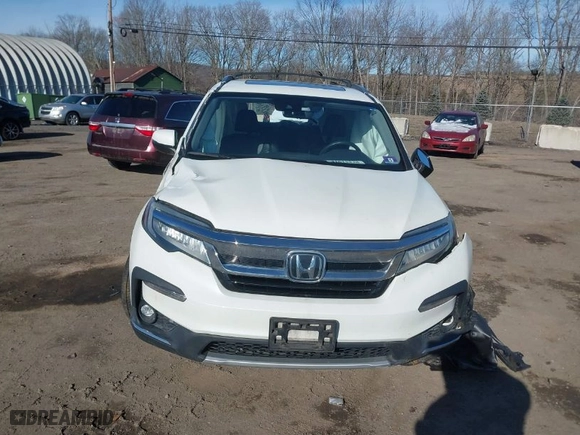 2019 Honda Pilot Touring 7-Passenger with VIN 5FNYF6H66KB073553, listed as a IAAI auction lot 41615538 with 74,882 mi miles. Bid and sale history available at carsss.com. Image 12.